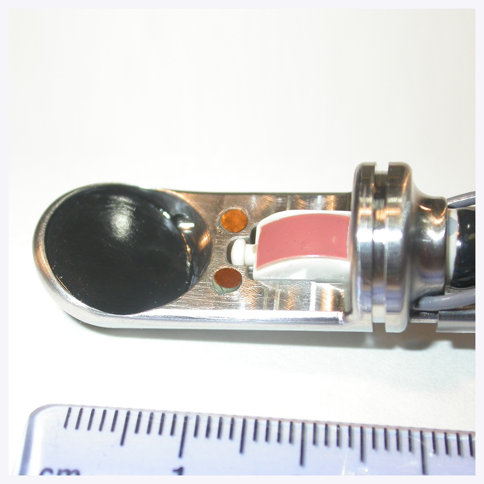 A wooden smoking pipe with a dark bowl and light-colored stem on a white background.