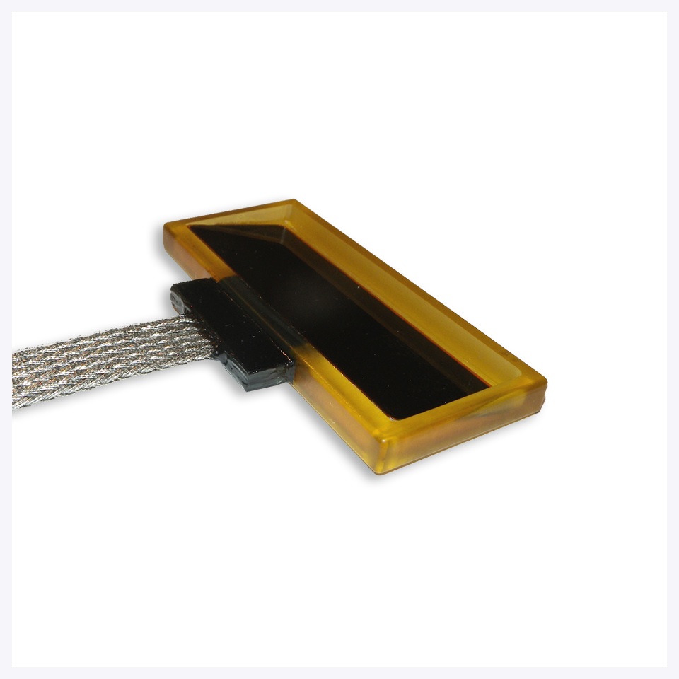 A brown and black handled brush or cleaning tool on a white background.