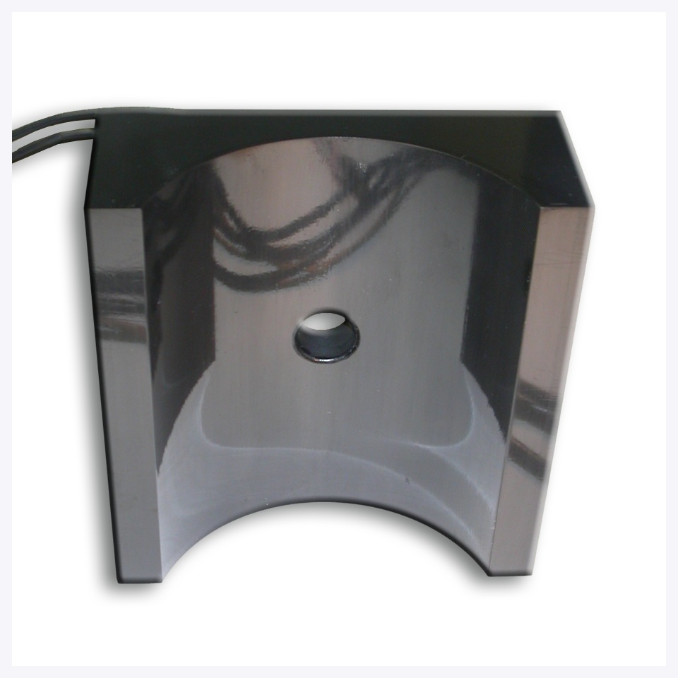 Gray foam corner protector or packaging insert with angular geometric shape on white background.